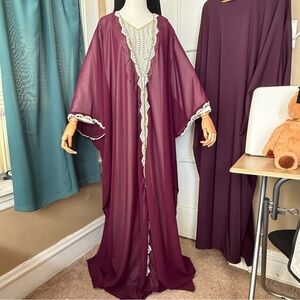 Burgundy bisht with bejeweled white inner dress